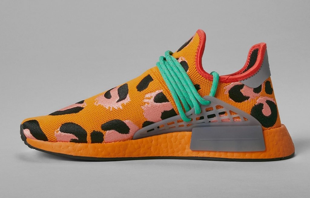 El guepardo inspira las manchas de la zapatilla Pharrell x adidas Originals Hu NMD “Animal Print Orange”.