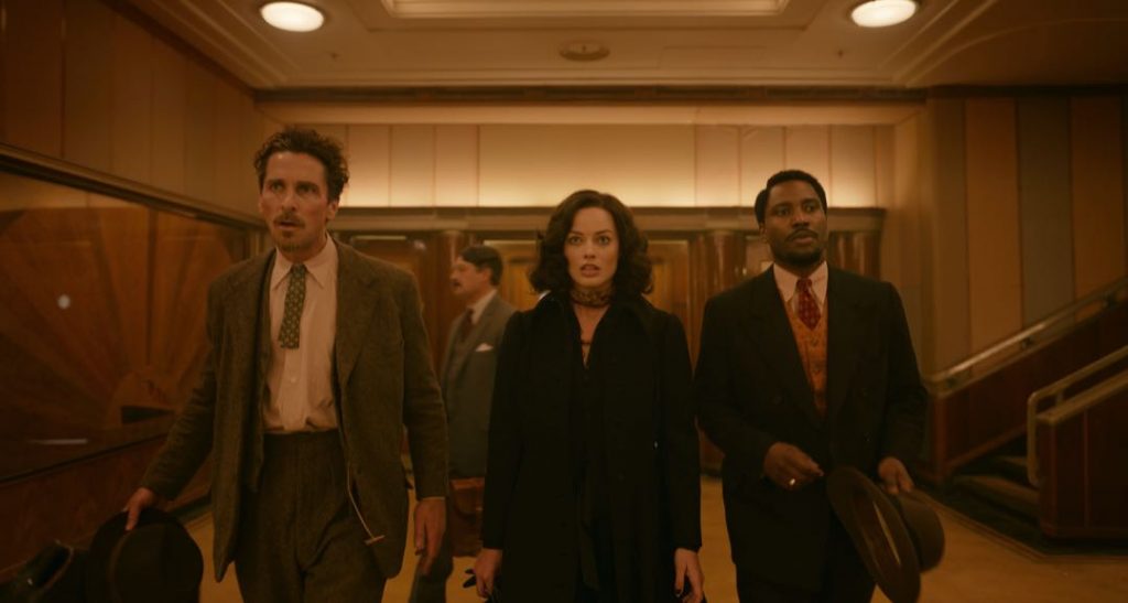 Christian Bale, Margot Robbie y John David Washington en la película "Ámsterdam" de David O. Russell. 